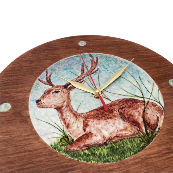 Wooden wall clock with a deer drawing